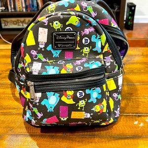 Loungefly Disneyparks Monsters Inc mini backpack